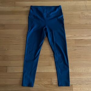 Teal high rise leggings. Stretchy fabric and comfortable fit. Pockets on side.